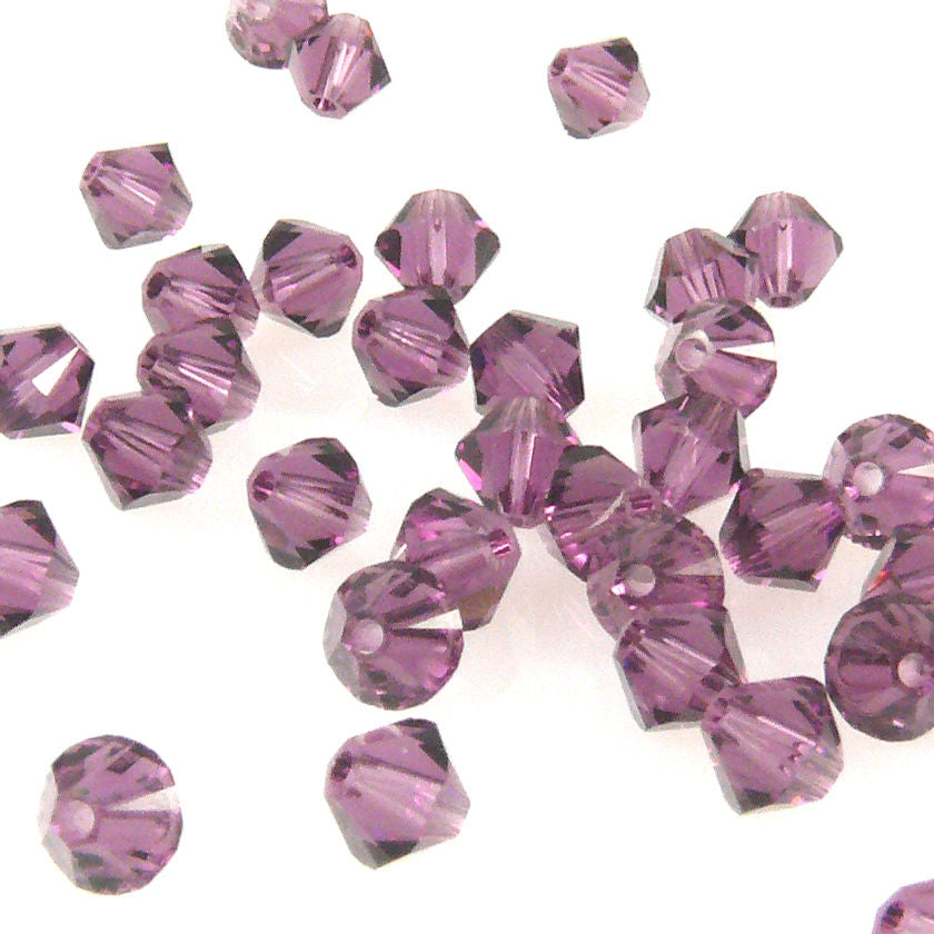 10x SWAROVSKI ELEMENTS 5328 Bicone 4mm amethyst Perlen Rhomben lila -1478