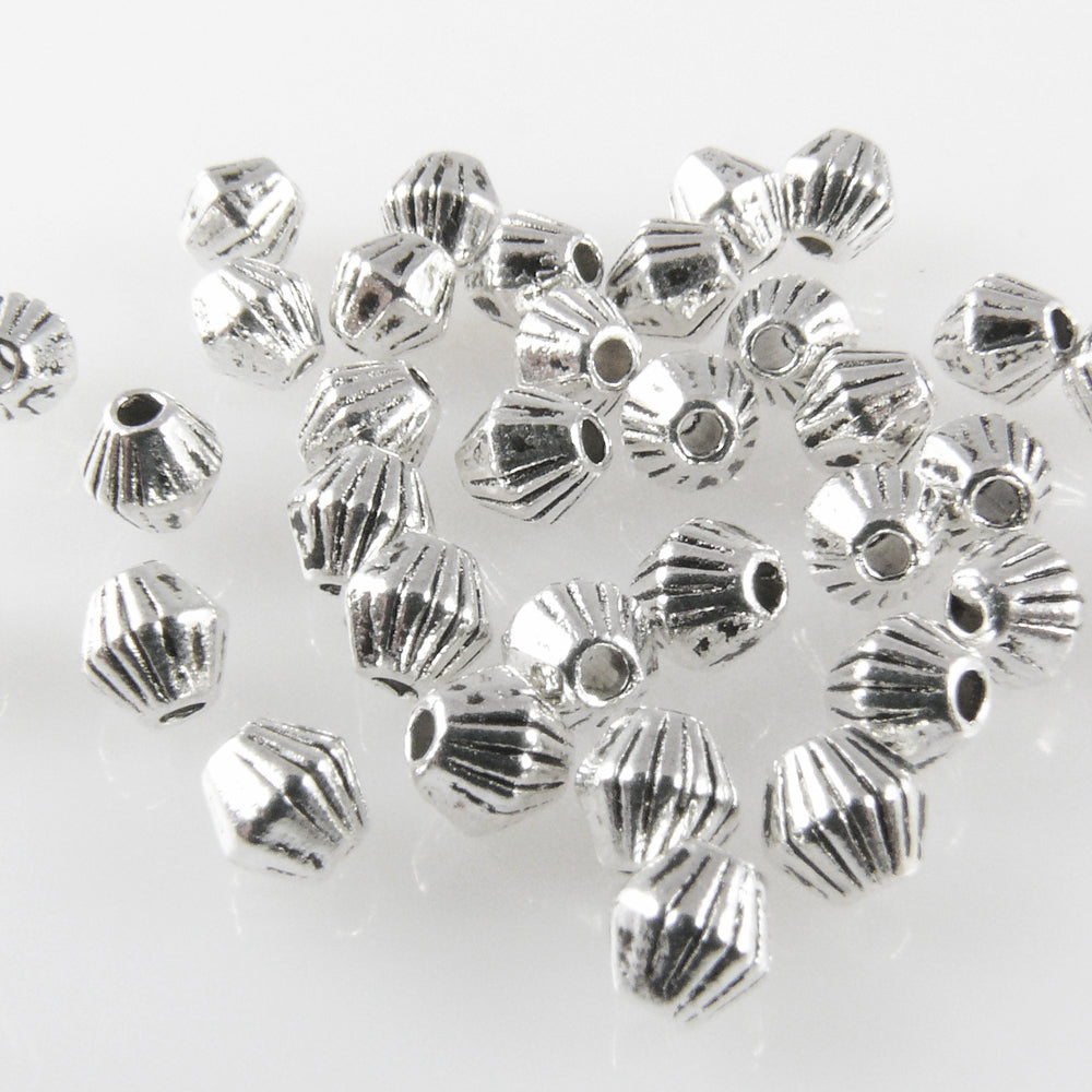 35 Metallperlen Doppelkegel 4mm Metall Spacer Perlen altsilber -1761
