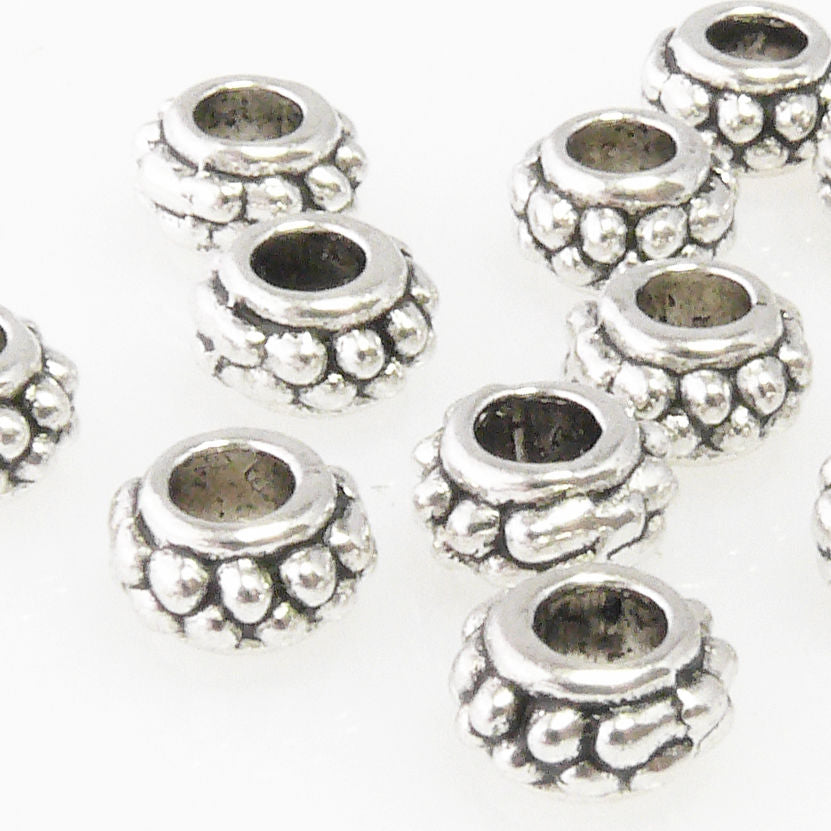 10 Metallperlen 4x7mm Spacer Großlochperlen altsilber Metall Perlen silber-362