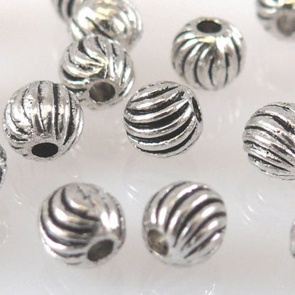 20 Metallperlen Kugeln 4mm Metall Perlen geriffelt altsilber Metallkugeln -1287