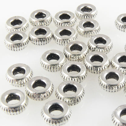 30 kleine Metallperlen Perlen 1,8x4,5mm Spacer silber Metall Rondelle