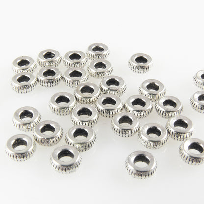 30 kleine Metallperlen Perlen 1,8x4,5mm Spacer silber Metall Rondelle