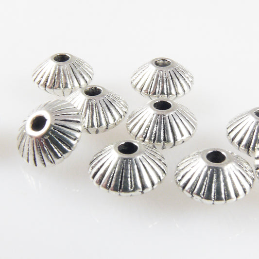 10 Metallperlen Spacer Bicone 5x7,5mm Metallrondelle geriffelt altsilber  -1759