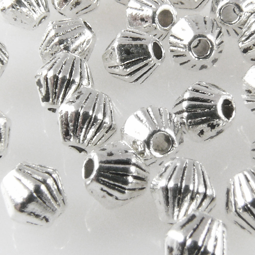 35 Metallperlen Doppelkegel 4mm Metall Spacer Perlen altsilber  -1761
