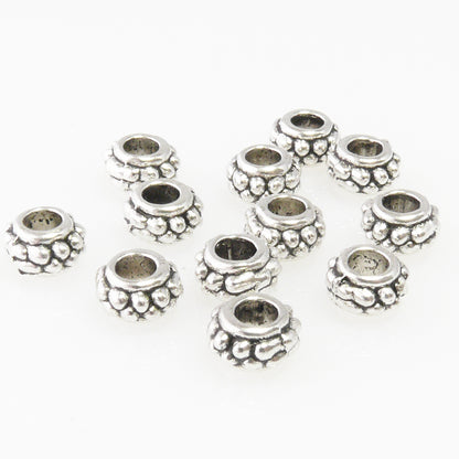 10 Metallperlen 4x7mm Spacer Großlochperlen altsilber Metall Perlen silber-362