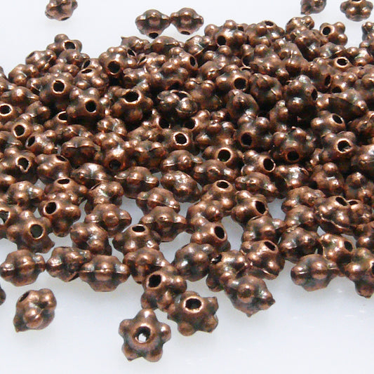 300 Metallperlen Spacer Rondelle 3x4mm Blüte kupferfarben Metall Perlen -7029