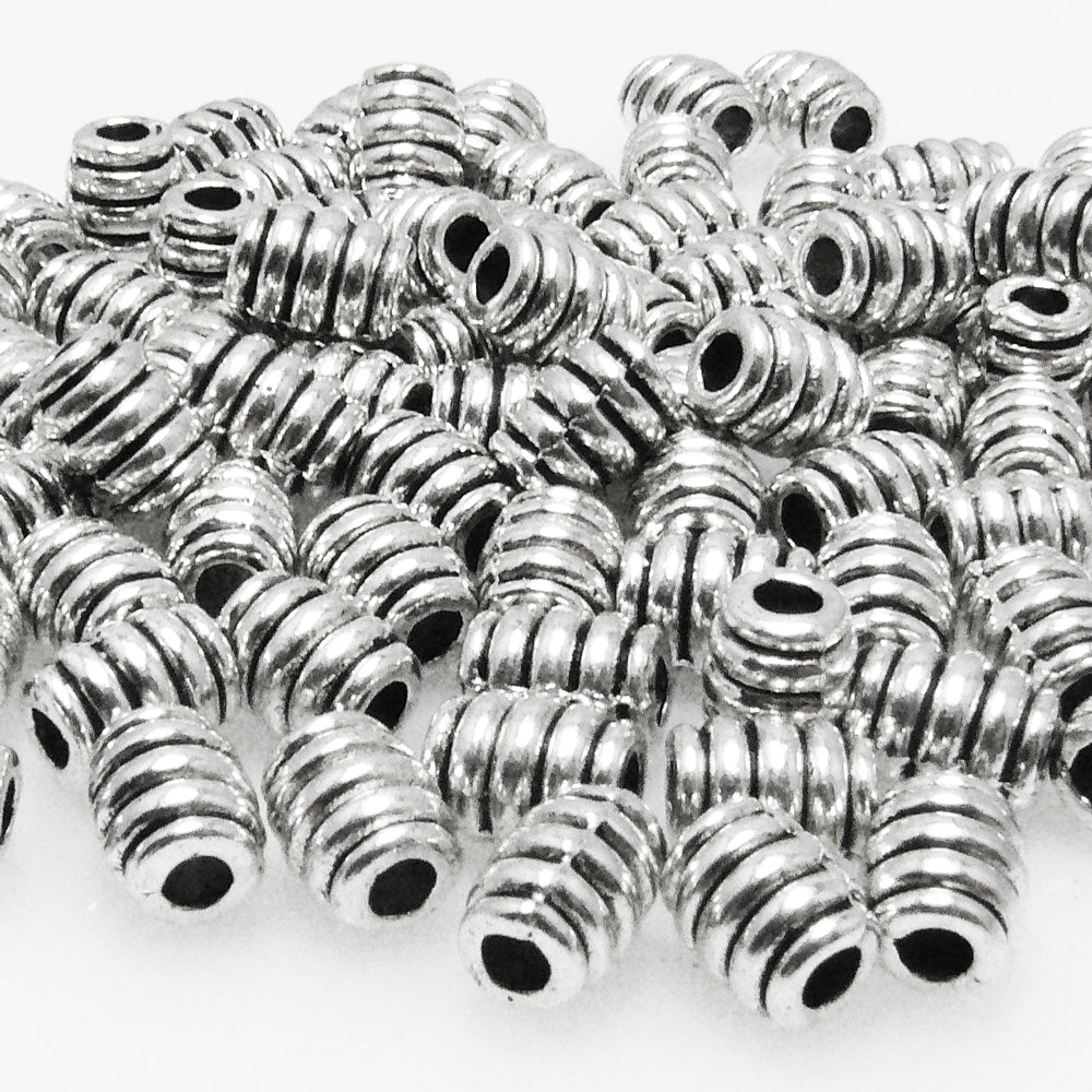100x Metallperlen 7x5mm Spacer Großlochperlen altsilber Bastelperlen neu -7046