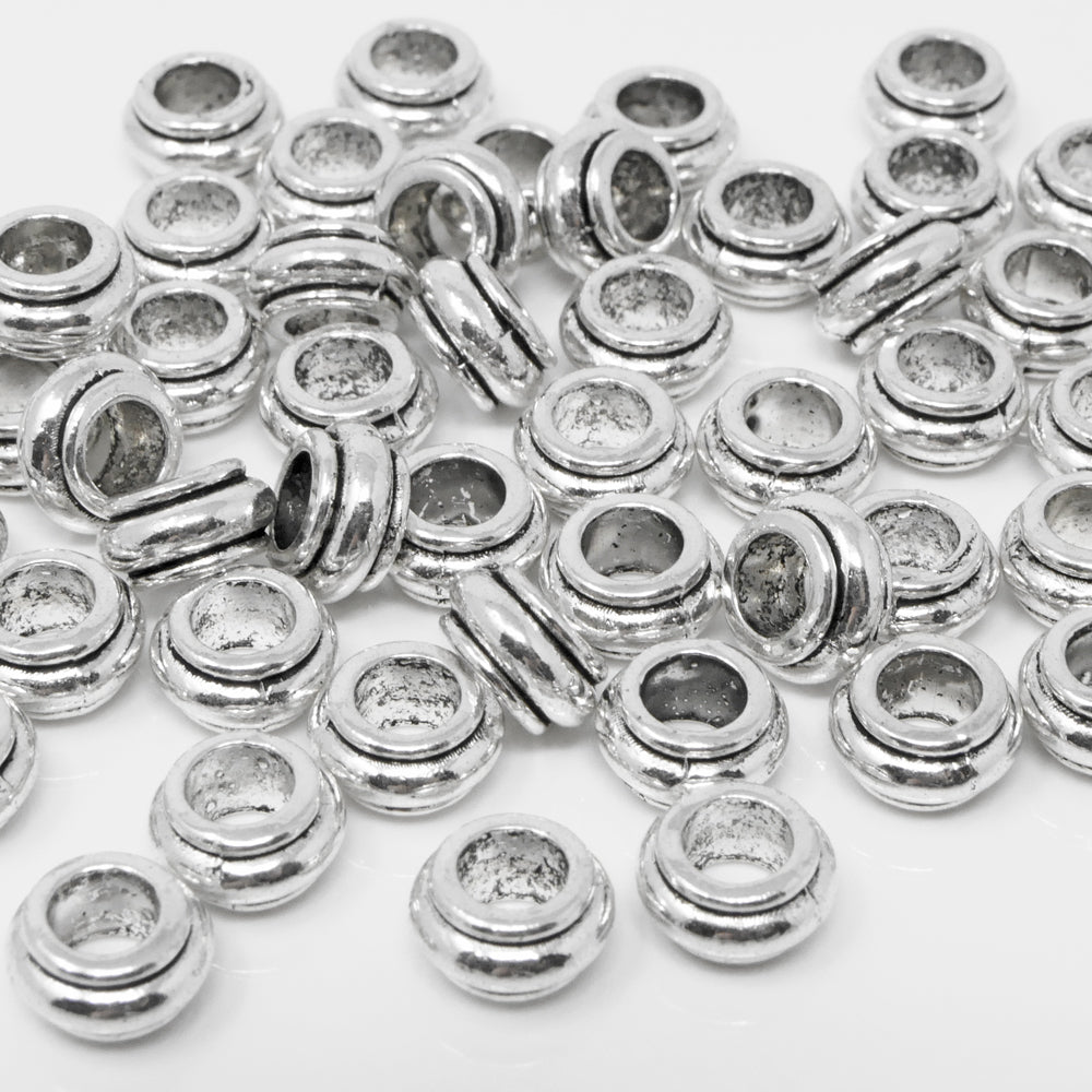 Metallperlen 5x9mm Spacer Großlochperlen altsilber 50x Metall Perlen neu -7047
