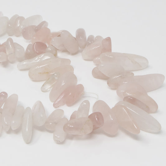 Perlenstrang Rosenquarz 70 Stäbchen Quarzperlen Rosa 13-30mm Edelsteinsplitter