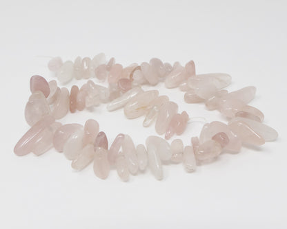 Perlenstrang Rosenquarz 70 Stäbchen Quarzperlen Rosa 13-30mm Edelsteinsplitter